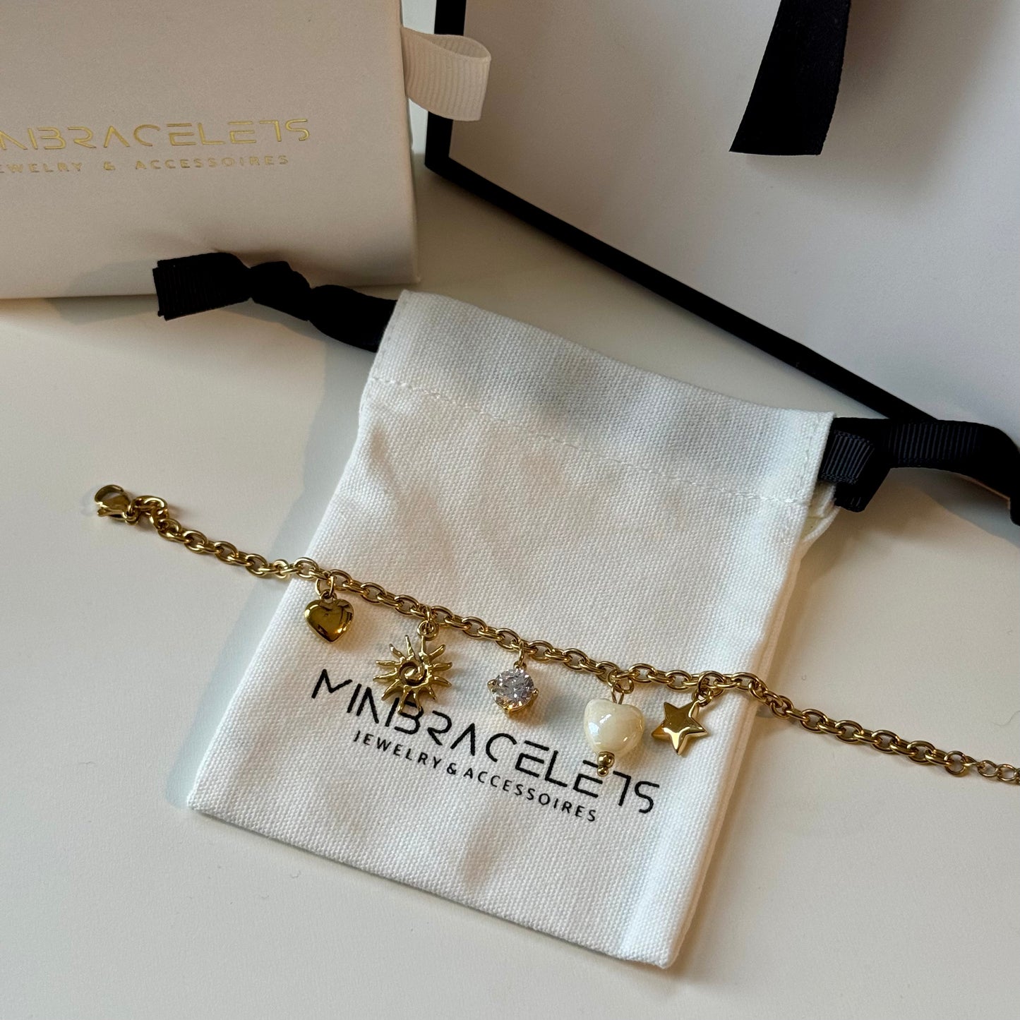 STAR CHARM ARMBAND GOLD